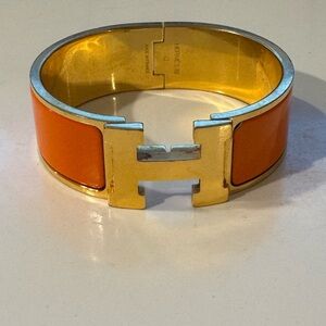Hermès Orange and Gold Wide Clic H Bracelet